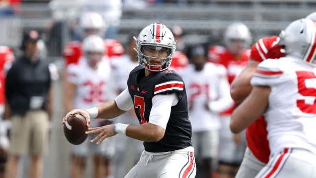 Apr 17, 2021; Columbus, Ohio, USA; Ohio State Buckeyes quarterback CJ Stroud (7) drops to throw during the first quarter of the annual spring game at Ohio Stadium. Mandatory Credit: Joseph Maiorana-USA TODAY Sports